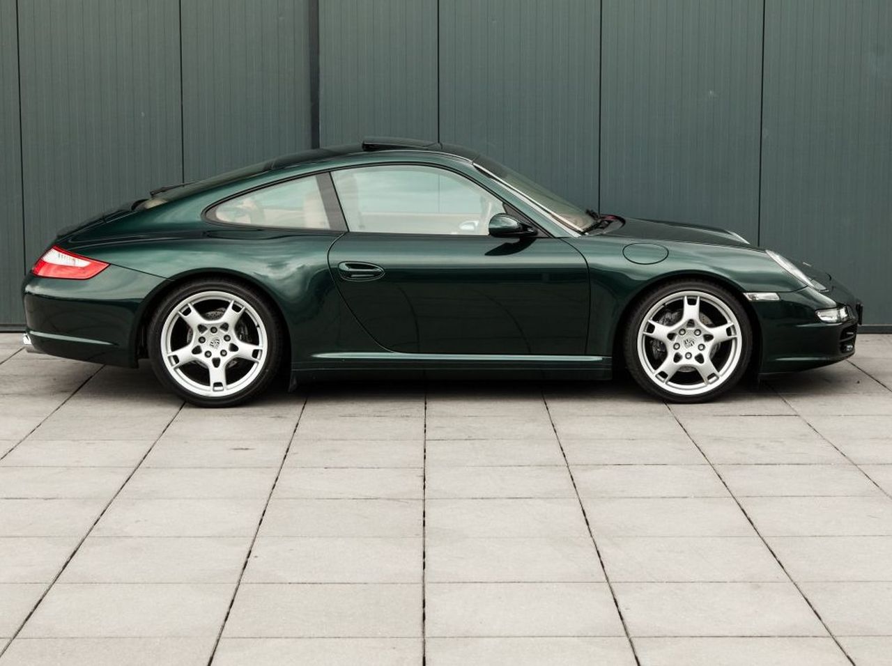 Afbeelding Maken of kraken? Groene 911 met hout in het interieur